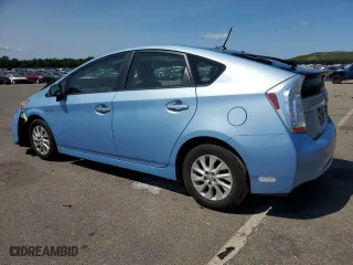 2014 Toyota Prius Plug-In with VIN JTDKN3DP5E3056010, listed as a Copart auction lot 69784694 with 83,018 mi miles and Salvage Title. Bid and sale history available at carsss.com. Image 2.