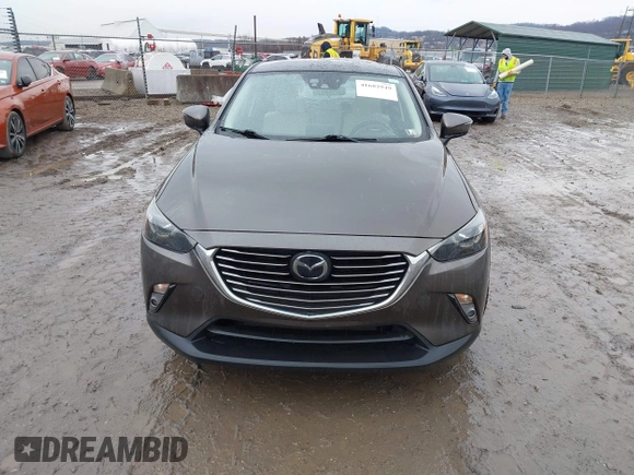 2016 Mazda CX-3 Grand Touring with VIN JM1DKBD77G0107328, listed as a IAAI auction lot 41682949 with 156,935 mi miles. Bid and sale history available at carsss.com. Image 12.