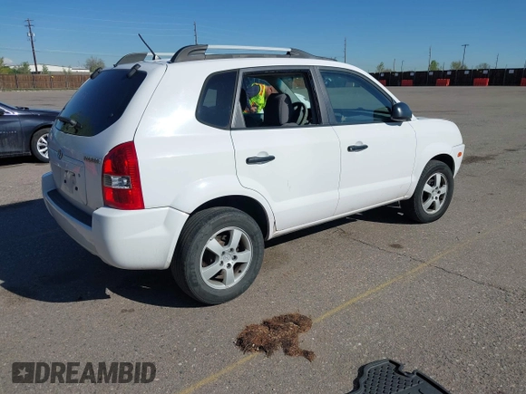 2006 Hyundai Tucson GL with VIN KM8JM72B56U324168, listed as a IAAI auction lot 42146955 with 206,919 mi miles. Bid and sale history available at carsss.com. Image 4.