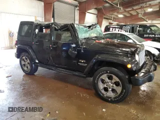 2016 Jeep Wrangler Unlimited Sahara with VIN 1C4BJWEG8GL188869, listed as a Copart auction lot 58128635 with 171,766 mi miles and Clean title. Bid and sale history available at DreamBid. Image 4.