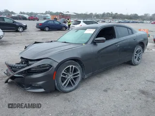 2019 Dodge Charger SXT with VIN 2C3CDXJG1KH730489, listed as a IAAI auction lot 41189171 with 39,514 mi miles and . Bid and sale history available at DreamBid. Image 2.