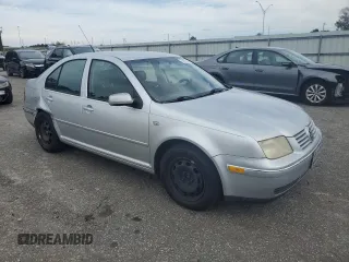 2004 Volkswagen Jetta GL with VIN 3VWRR69M34M108439, listed as a Copart auction lot 74029704 with 296,984 mi miles and Salvage title. Bid and sale history available at DreamBid. Image 4.