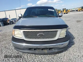 1999 Ford F-150 z VIN 1FTRX07WXXKB92796, wystawiony jako Copart lot #48352405 z przebiegiem Nie podano mil oraz Szkoda całkowita • Salvage title. Historia ofert i sprzedaży dostępna na DreamBid. Obrazek 5.