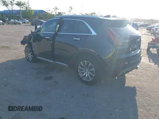 2021 Cadillac XT4 FWD Premium Luxury with VIN 1GYFZCR47MF000064, listed as a IAAI auction lot 41974115 with 1 mi miles. Bid and sale history available at carsss.com. Image 3.