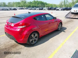 2016 Hyundai Veloster z VIN KMHTC6AD0GU286455, wystawiony jako IAAI lot #42244377 z przebiegiem 121 757 mil mil oraz . Historia ofert i sprzedaży dostępna na DreamBid. Obrazek 4.