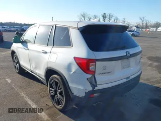 2021 Honda Passport Sport with VIN 5FNYF8H21MB031674, listed as a IAAI auction lot 41739769 with 36,894 mi miles and . Bid and sale history available at DreamBid. Image 3.
