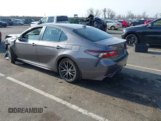 2023 Toyota Camry SE z VIN 4T1G11BK7PU077382, wystawiony jako IAAI lot #41785765 z przebiegiem 34 953 mil mil oraz . Historia ofert i sprzedaży dostępna na DreamBid. Obrazek 3.