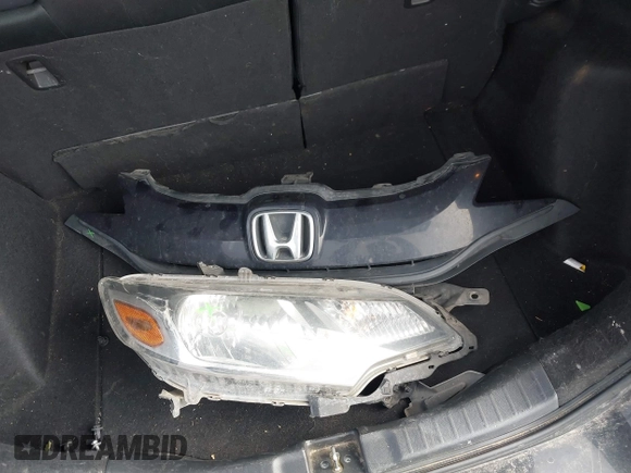 2015 Honda Fit LX with VIN 3HGGK5H50FM768011, listed as a IAAI auction lot 41499374 with 142,211 mi miles and . Bid and sale history available at DreamBid. Image 12.