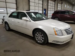 2008 Cadillac DTS 1SA z VIN 1G6KD57Y08U136593, wystawiony jako Copart lot #49208925 z przebiegiem 145 099 mil mil oraz Szkoda całkowita • Salvage title. Historia ofert i sprzedaży dostępna na DreamBid. Obrazek 4.