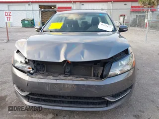2013 Volkswagen Passat Wolfsburg Edition z VIN 1VWAP7A36DC114152, wystawiony jako IAAI lot #41911437 z przebiegiem 163 048 mil mil oraz . Historia ofert i sprzedaży dostępna na DreamBid. Obrazek 13.