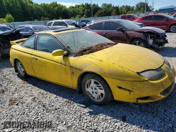 2001 Saturn SC z VIN 1G8ZR12781Z311096, wystawiony jako Copart lot #60574014 z przebiegiem Nie podano mil oraz Tytuł czysty. Historia ofert i sprzedaży dostępna na DreamBid. Obrazek 4.