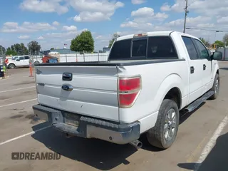 2014 Ford F-150 XL with VIN 1FTFW1CT8EKF55164, listed as a IAAI auction lot 42111483 with 233,166 mi miles. Bid and sale history available at carsss.com. Image 4.
