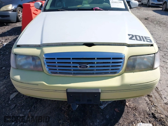 1999 Ford Crown Victoria Police z VIN 2FAFP71WXXX239705, wystawiony jako IAAI lot #41601390 z przebiegiem 161 454 mil mil oraz . Historia ofert i sprzedaży dostępna na DreamBid. Obrazek 6.