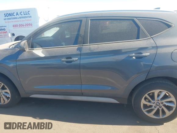 2018 Hyundai Tucson SEL z VIN KM8J33A42JU681606, wystawiony jako IAAI lot #41067514 z przebiegiem 150 119 mil mil oraz . Historia ofert i sprzedaży dostępna na DreamBid. Obrazek 14.