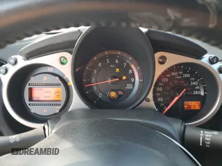 2014 Nissan 370Z z VIN JN1AZ4EH9EM636239, wystawiony jako Copart lot #69833264 z przebiegiem 110 802 mil mil oraz Szkoda całkowita • Salvage title. Historia ofert i sprzedaży dostępna na DreamBid. Obrazek 9.