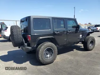 2014 Jeep Wrangler Unlimited Sahara z VIN 1C4BJWEG4EL164226, wystawiony jako Copart lot #53849355 z przebiegiem 82 145 mil mil oraz Szkoda całkowita • Salvage title. Historia ofert i sprzedaży dostępna na DreamBid. Obrazek 3.