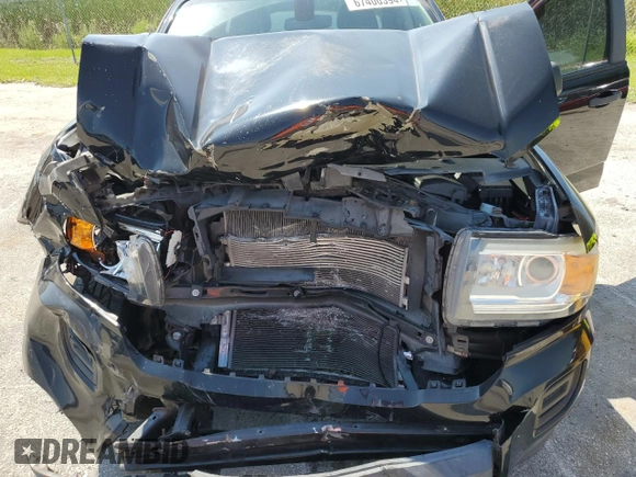 2016 GMC Canyon 2WD with VIN 1GTG5BEA8G1205647, listed as a Copart auction lot 67400394 with 101,859 mi miles and Salvage Title. Bid and sale history available at carsss.com. Image 13.