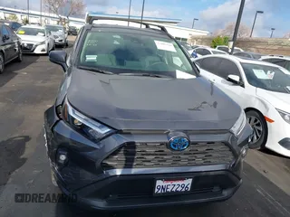 2024 Toyota RAV4 Hybrid XLE Premium with VIN JTMB6RFV2RD138594, listed as a IAAI auction lot 41885310 with 12,330 mi miles. Bid and sale history available at carsss.com. Image 13.