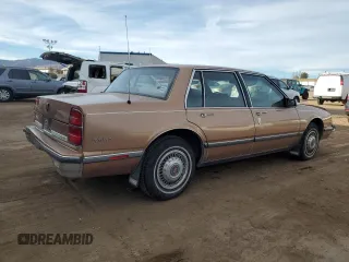 1989 Oldsmobile Delta z VIN 1G3HN54C2KW373577, wystawiony jako Copart lot #41532245 z przebiegiem 78 364 mil mil oraz Tytuł czysty. Historia ofert i sprzedaży dostępna na DreamBid. Obrazek 3.