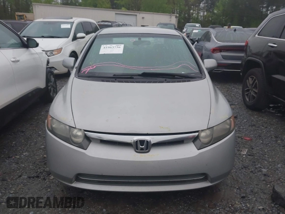 2006 Honda Civic LX with VIN 2HGFA16556H520894, listed as a IAAI auction lot 41963736 with 166,682 mi miles and . Bid and sale history available at DreamBid. Image 12.