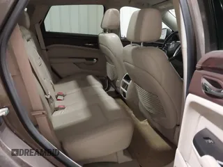 2014 Cadillac SRX Performance Collection z VIN 3GYFNFE38ES578066, wystawiony jako IAAI lot #42153023 z przebiegiem 134 009 mil mil oraz . Historia ofert i sprzedaży dostępna na DreamBid. Obrazek 8.