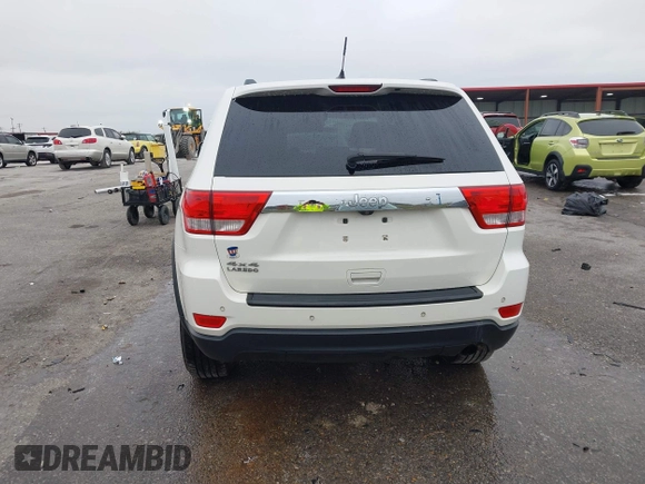 2012 Jeep Grand Cherokee Laredo with VIN 1C4RJFAG6CC297958, listed as a IAAI auction lot 40859811 with 213,499 mi miles. Bid and sale history available at carsss.com. Image 16.