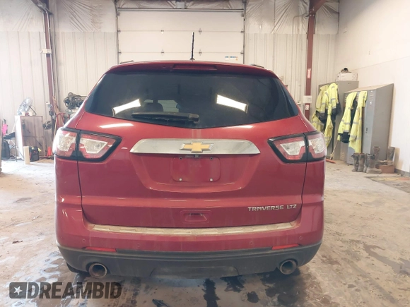 2014 Chevrolet Traverse LTZ z VIN 1GNKRJKD8EJ210990, wystawiony jako IAAI lot #41655601 z przebiegiem 218 804 mil mil oraz . Historia ofert i sprzedaży dostępna na DreamBid. Obrazek 16.