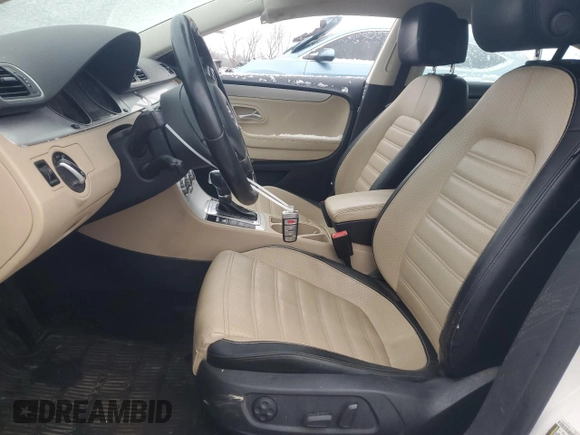 2013 Volkswagen CC Sport Plus z VIN WVWBP7AN1DE555927, wystawiony jako Copart lot #49028445 z przebiegiem 132 109 mil mil oraz Szkody całkowita. Historia ofert i sprzedaży dostępna na DreamBid. Obrazek 7.