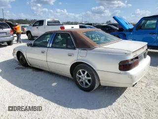 2003 Cadillac Seville Luxury SLS z VIN 1G6KS54Y03U289834, wystawiony jako Copart lot #77362694 z przebiegiem Nie podano mil oraz Szkoda całkowita • Salvage title. Historia ofert i sprzedaży dostępna na DreamBid. Obrazek 2.