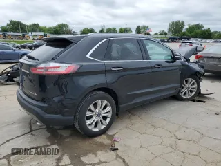2020 Ford Edge Titanium с VIN 2FMPK3K93LBB56277, выставлен на аукционе Copart как лот 57502985 с пробегом 80 352 миль миль и Списание • Salvage title. История ставок и продаж доступна на DreamBid. Изображение 3.
