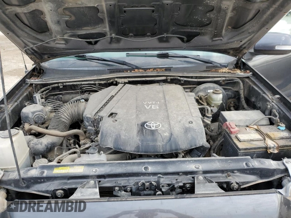 2012 Toyota Tacoma with VIN 3TMLU4EN0CM094637, listed as a Copart auction lot 55335095 with 131,645 mi miles and Salvage title. Bid and sale history available at DreamBid. Image 11.