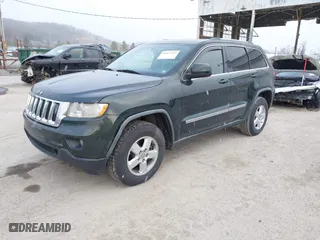 2011 Jeep Grand Cherokee Laredo with VIN 1J4RR4GG9BC546198, listed as a IAAI auction lot 41879387 with 190,973 mi miles. Bid and sale history available at carsss.com. Image 17.