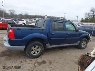 2005 Ford Explorer Sport Trac XLS with VIN 1FMZU77K35UA59213, listed as a IAAI auction lot 41690884 with 219,652 mi miles. Bid and sale history available at carsss.com. Image 13.