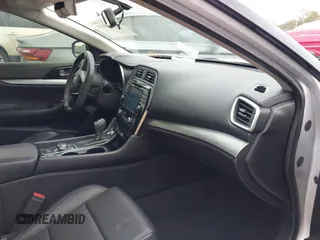 2016 Nissan Maxima SL with VIN 1N4AA6AP4GC383276, listed as a IAAI auction lot 41599834 with 47,098 mi miles and . Bid and sale history available at DreamBid. Image 5.