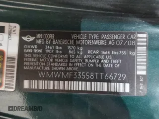 2008 MINI Hardtop with VIN WMWMF33558TT66729, listed as a Copart auction lot 51153645 with 127,357 mi miles and Salvage Title. Bid and sale history available at DreamBid. Image 12.