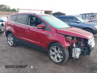 2019 Ford Escape Titanium with VIN 1FMCU9J90KUA97517, listed as a IAAI auction lot 42418024 with 96,189 mi miles and . Bid and sale history available at DreamBid. Image 1.