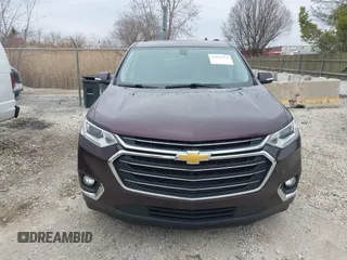 2018 Chevrolet Traverse LT Cloth z VIN 1GNERGKW2JJ282845, wystawiony jako IAAI lot #41990694 z przebiegiem 101 659 mil mil oraz . Historia ofert i sprzedaży dostępna na DreamBid. Obrazek 12.
