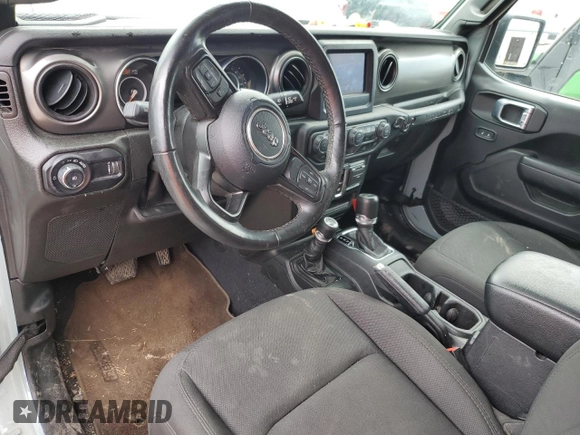 2023 Jeep Wrangler Sport with VIN 1C4HJXAG0PW595881, listed as a Copart auction lot 65590025 with 19,597 mi miles and Salvage title. Bid and sale history available at DreamBid. Image 8.