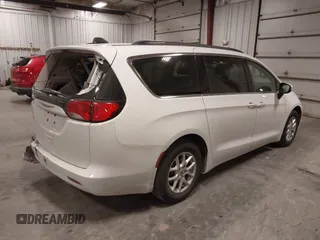 2021 Chrysler Voyager LXi with VIN 2C4RC1DG5MR508956, listed as a IAAI auction lot 41547647 with 104,563 mi miles and . Bid and sale history available at DreamBid. Image 4.