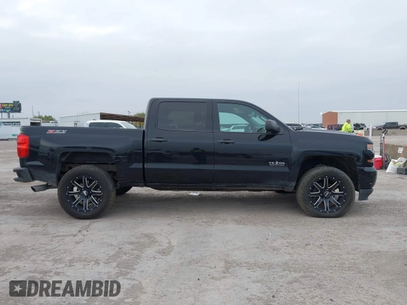 2017 Chevrolet Silverado 1500 LT with VIN 1GCUKREC2HF208232, listed as a IAAI auction lot 40933445 with 105,928 mi miles and . Bid and sale history available at DreamBid. Image 13.