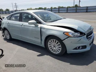 2013 Ford Fusion SE Hybrid with VIN 3FA6P0LU9DR281697, listed as a Copart auction lot 58583675 with 136,121 mi miles and Salvage title. Bid and sale history available at DreamBid. Image 4.
