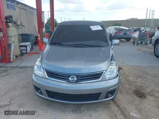 2011 Nissan Versa 1.8 SL with VIN 3N1BC1CP7BL446671, listed as a IAAI auction lot 42003858 with 96,939 mi miles. Bid and sale history available at carsss.com. Image 12.