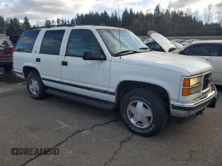 1997 GMC Yukon with VIN 1GKEK13R5VJ762200, listed as a Copart auction lot 47579745 with 165,573 mi miles and Clean Title. Bid and sale history available at carsss.com. Image 4.