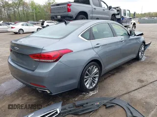 2015 Hyundai Genesis 3.8L with VIN KMHGN4JE8FU098774, listed as a IAAI auction lot 42069813 with 76,397 mi miles. Bid and sale history available at carsss.com. Image 4.