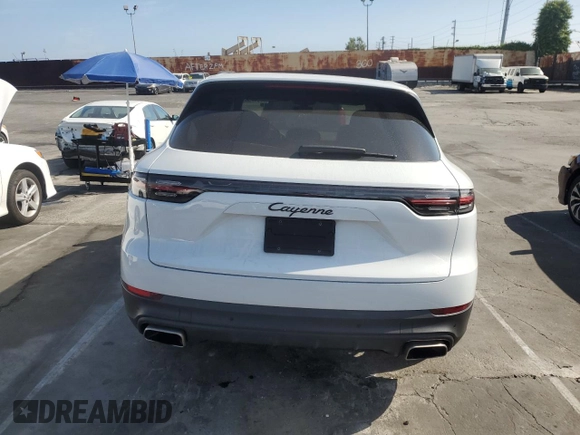 2021 Porsche Cayenne with VIN WP1AA2AYXMDA00148, listed as a Copart auction lot 52647565 with 27,977 mi miles and Salvage title. Bid and sale history available at DreamBid. Image 6.