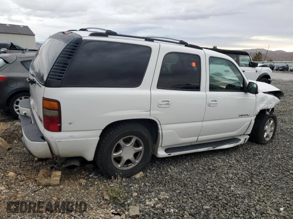 2001 GMC Yukon Denali z VIN 1GKEK63U01J287101, wystawiony jako Copart lot #43659115 z przebiegiem Nie podano mil oraz Szkoda całkowita • Salvage title. Historia ofert i sprzedaży dostępna na DreamBid. Obrazek 3.