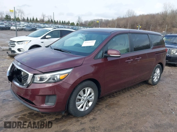 2017 Kia Sedona LX with VIN KNDMB5C12H6236364, listed as a IAAI auction lot 41924391 with 100,546 mi miles. Bid and sale history available at carsss.com. Image 2.