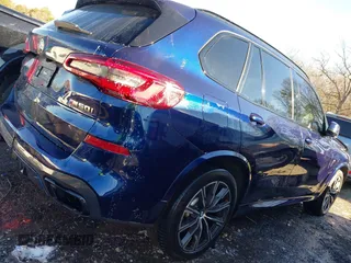 2020 BMW X5 M50i with VIN 5UXJU4C03LL227857, listed as a IAAI auction lot 41351112 with 65,325 mi miles and . Bid and sale history available at DreamBid. Image 20.