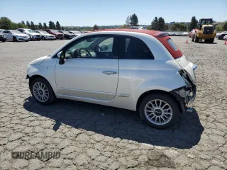 2013 FIAT 500 Lounge with VIN 3C3CFFER9DT744019, listed as a Copart auction lot 63481055 with 49,869 mi miles and Salvage title. Bid and sale history available at DreamBid. Image 2.