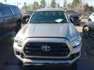2017 Toyota Tacoma SR with VIN 5TFAX5GN2HX096442, listed as a IAAI auction lot 41667984 with 63,377 mi miles. Bid and sale history available at carsss.com. Image 12.